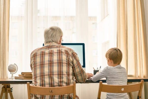 Senior parent and child enjoying quality time together at home.